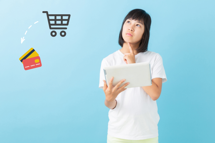 A woman shopper thinks about warranty cost while making an online purchase with shopping cart and credit card images