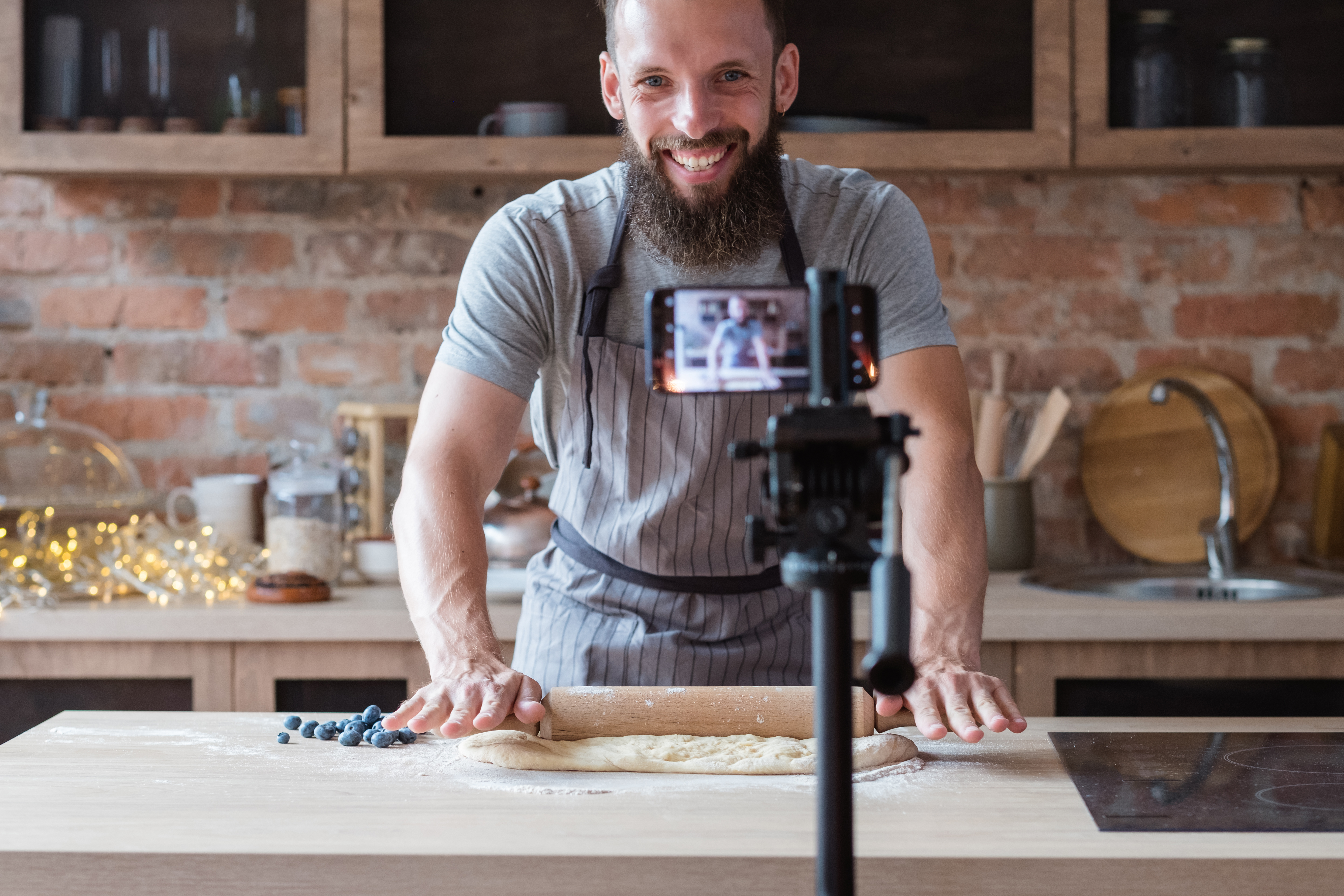 Man smiling getting ready to start live streaming