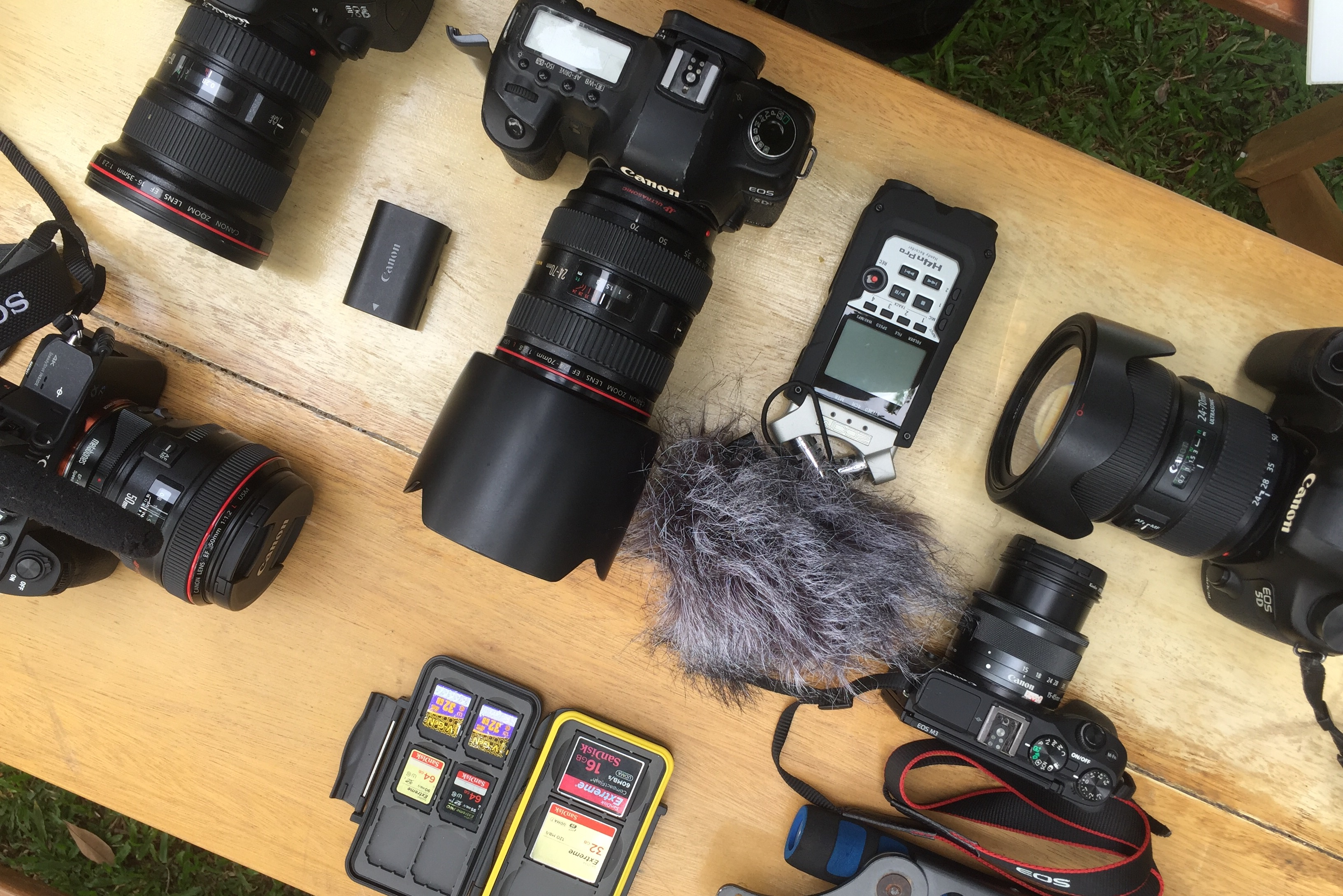 Cameras and accessories on a table