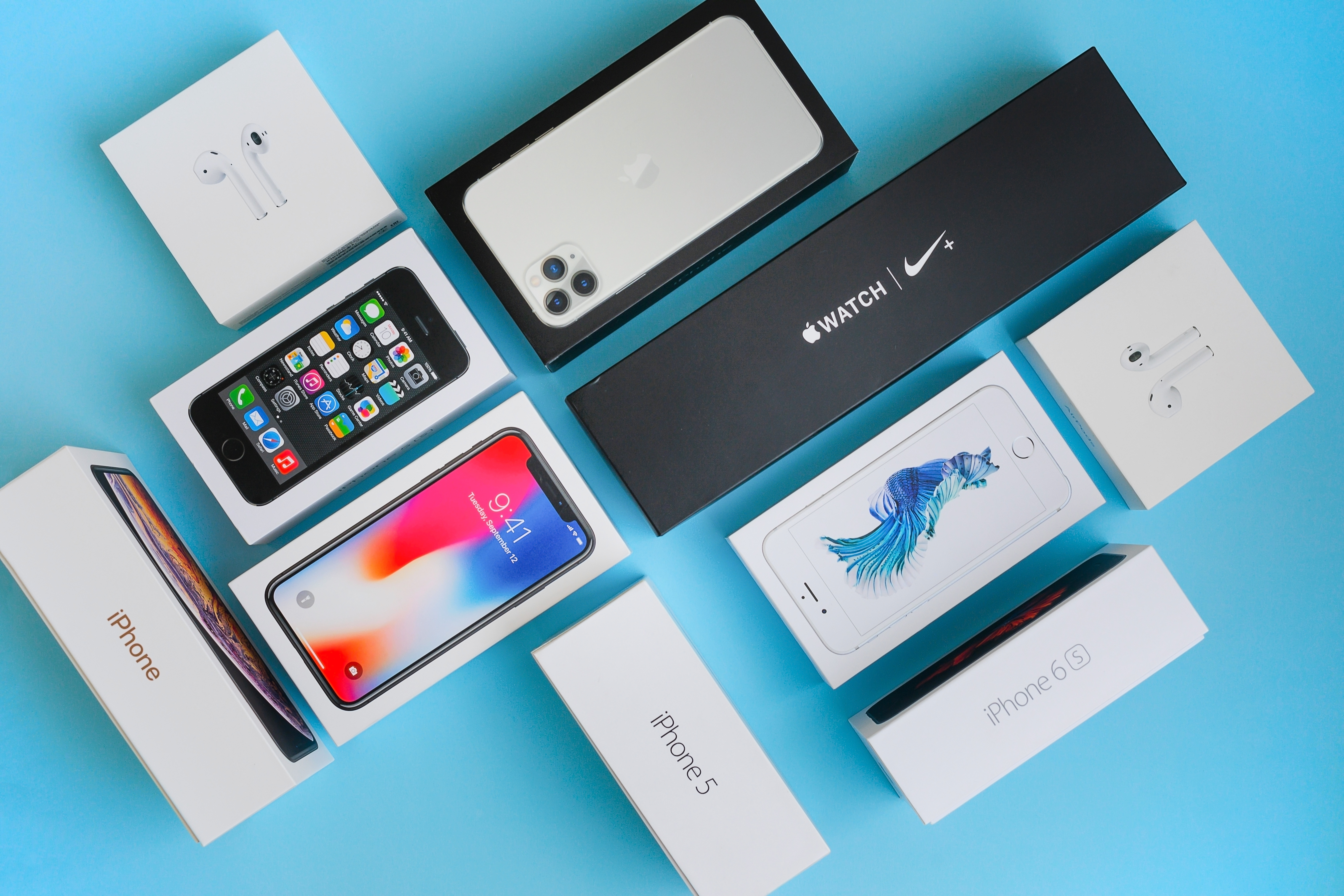 An array of Apple products on a blue background