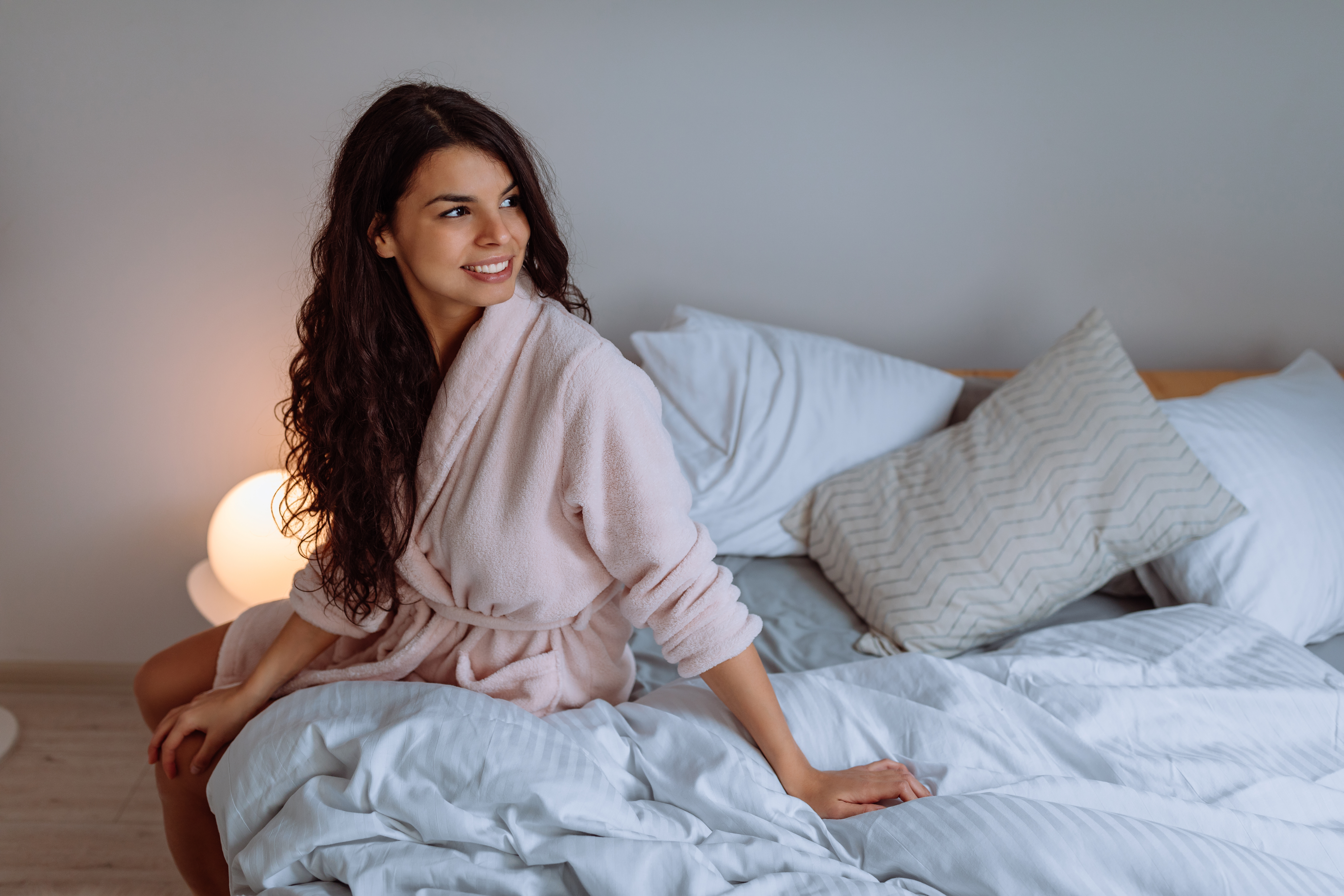 Woman sitting in bed