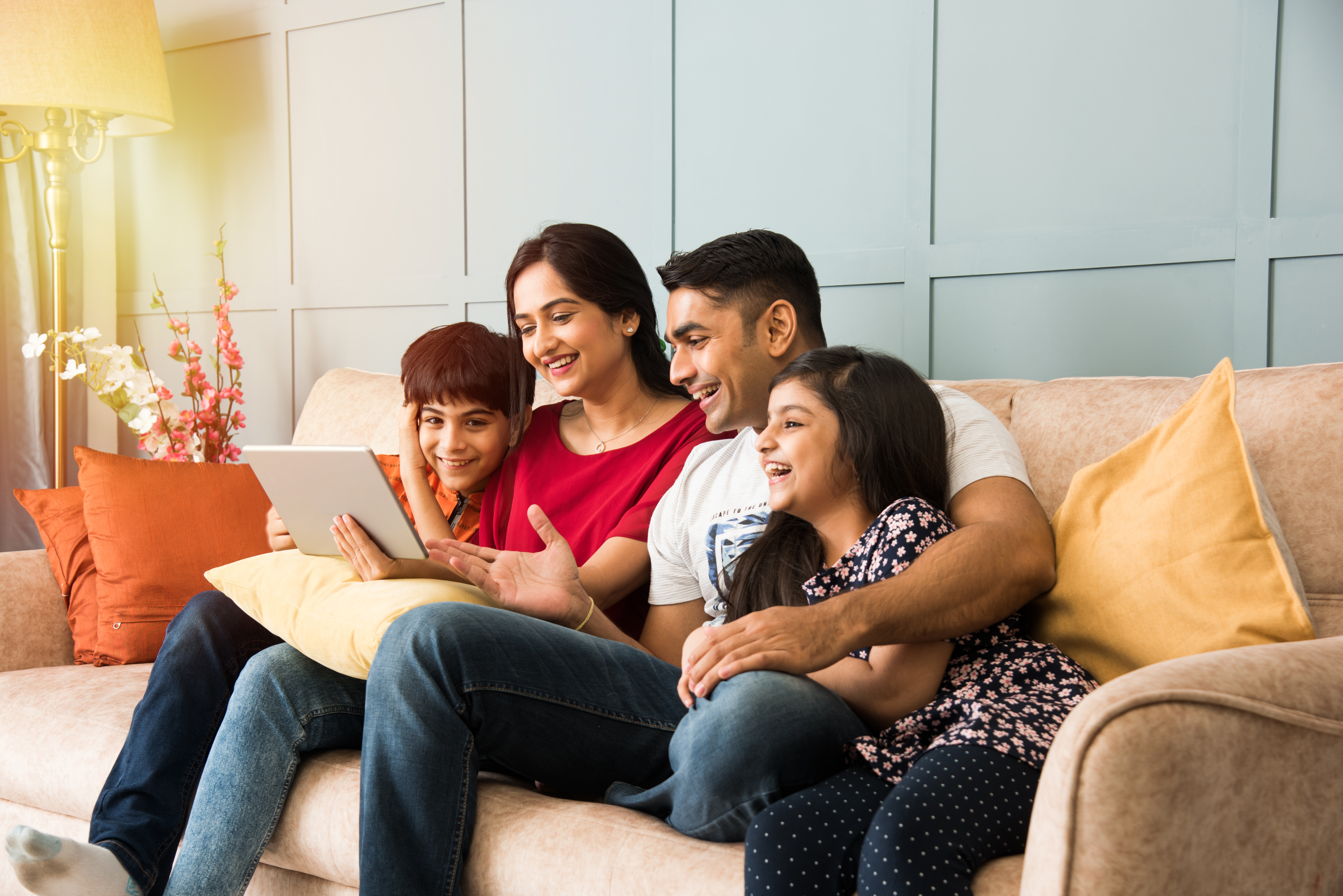 Family watching a movie on a tablet