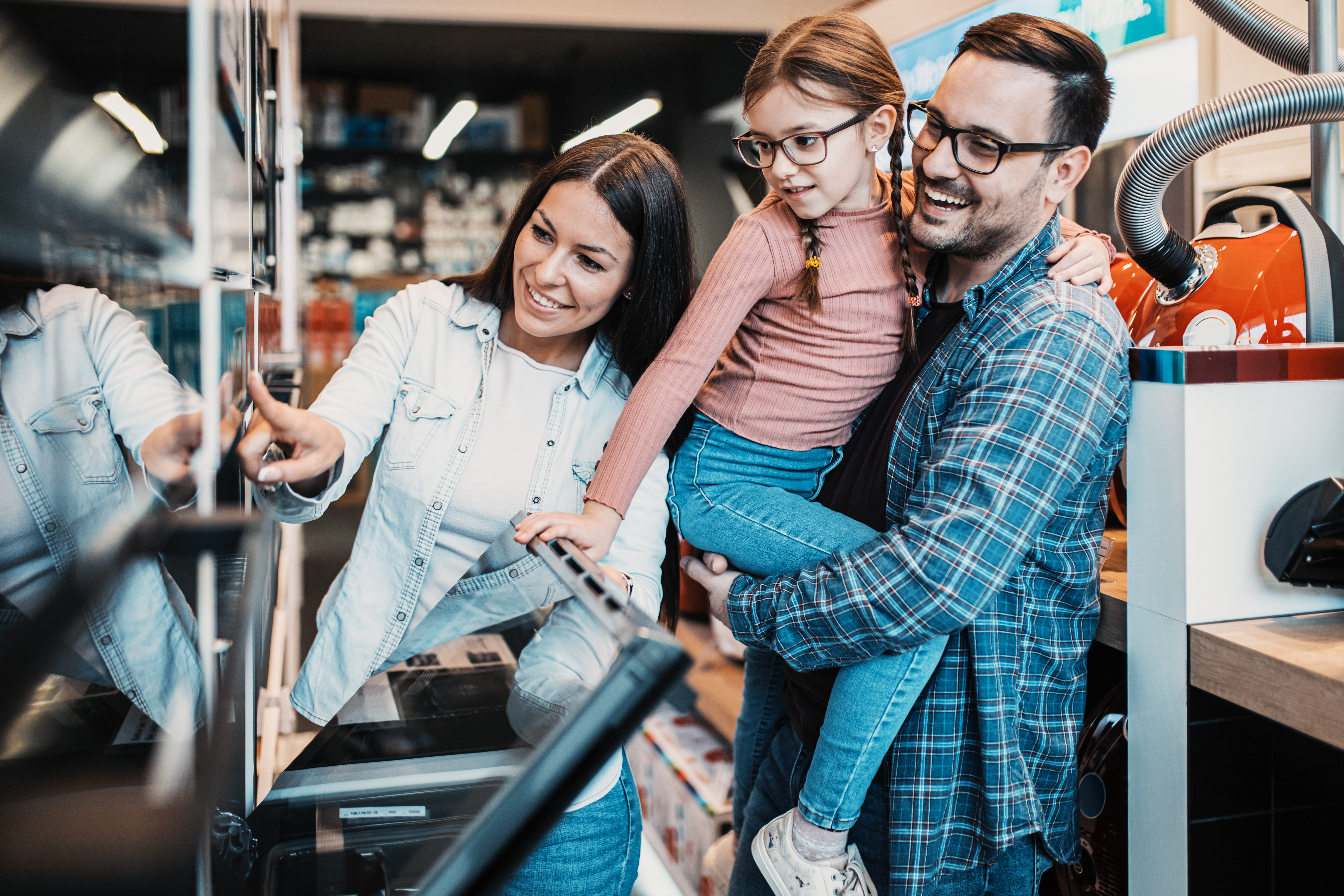 Family looking at an oven