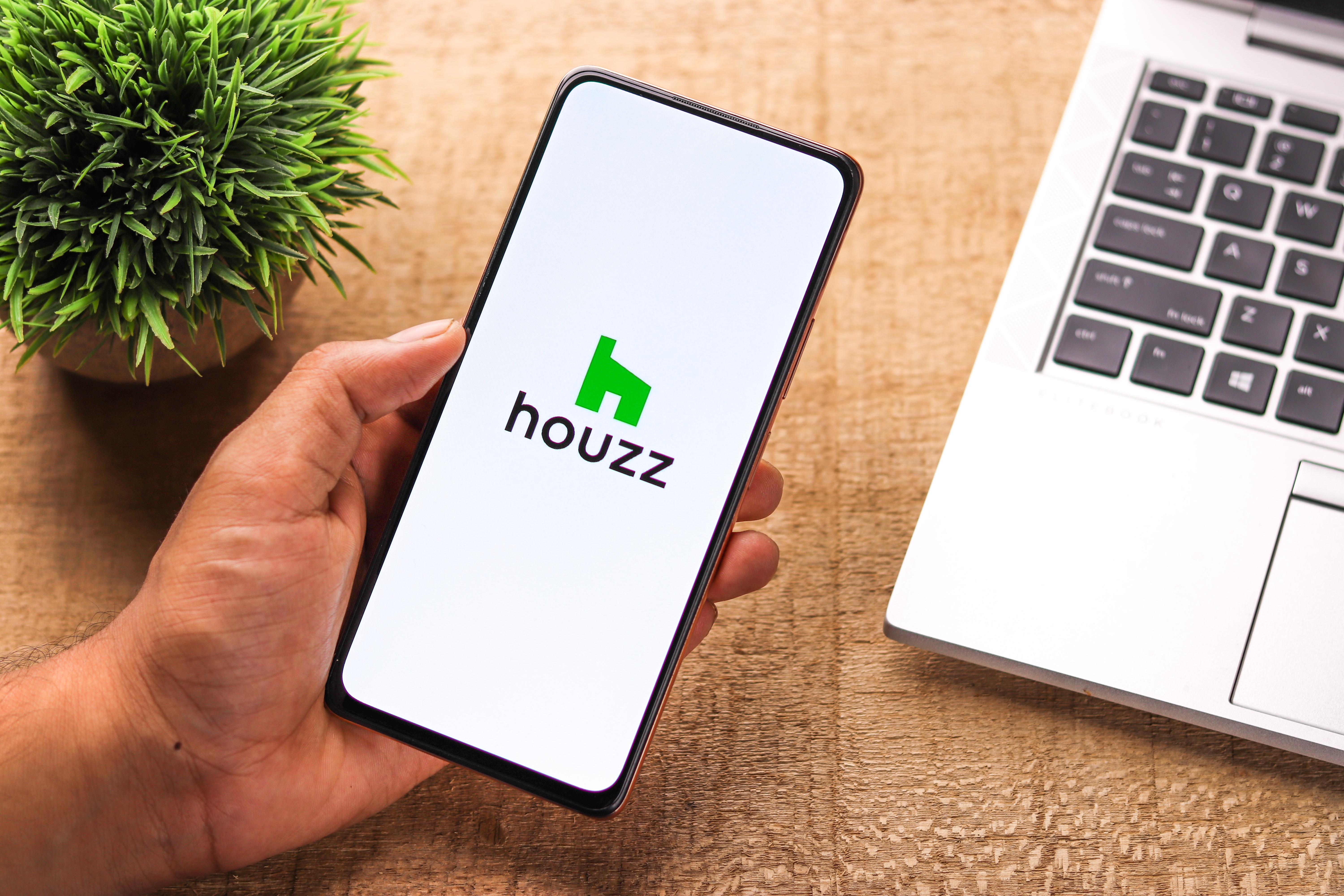 Smartphone displaying the Houzz logo