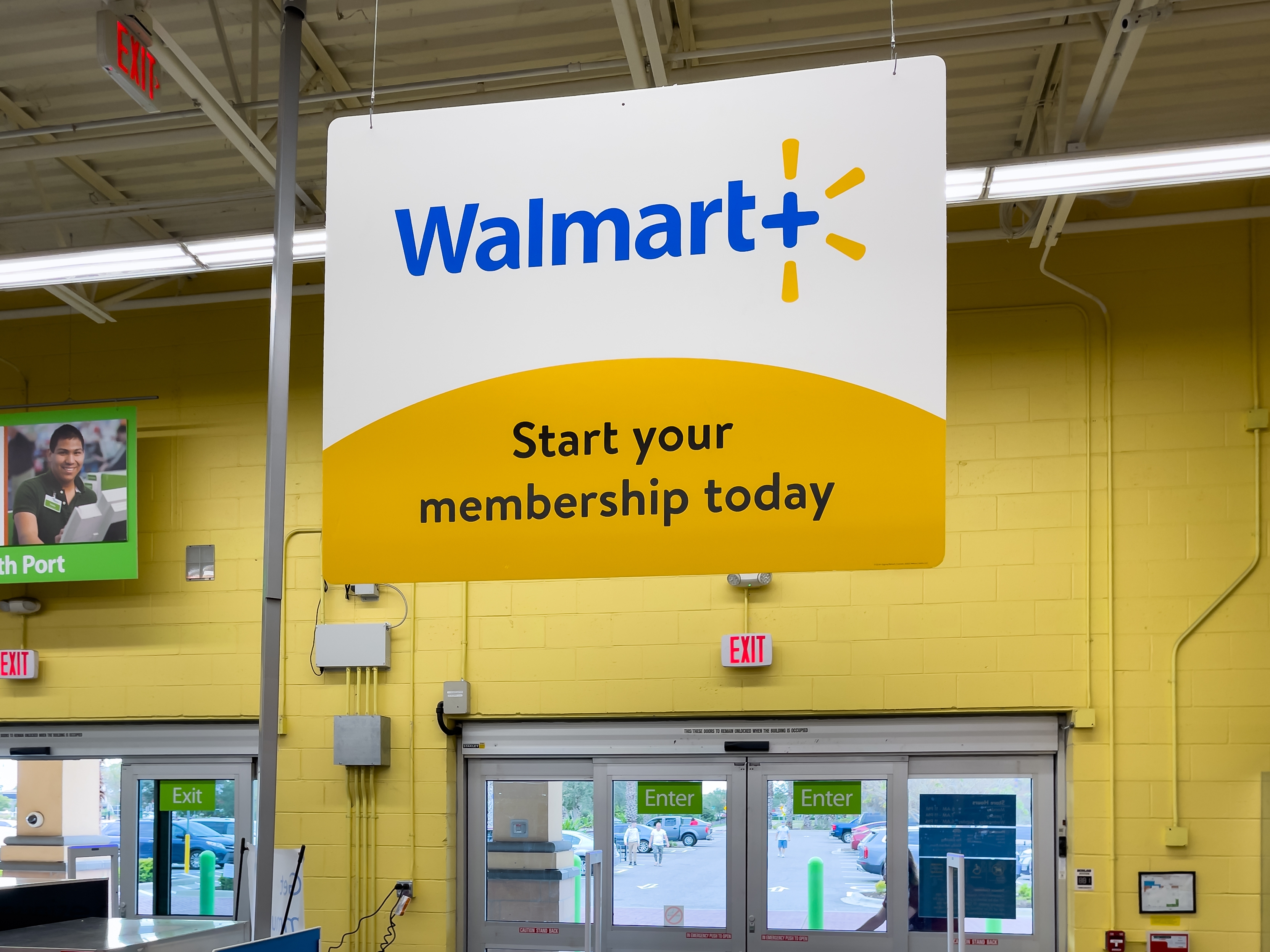 Sign advertising a Walmart+ membership