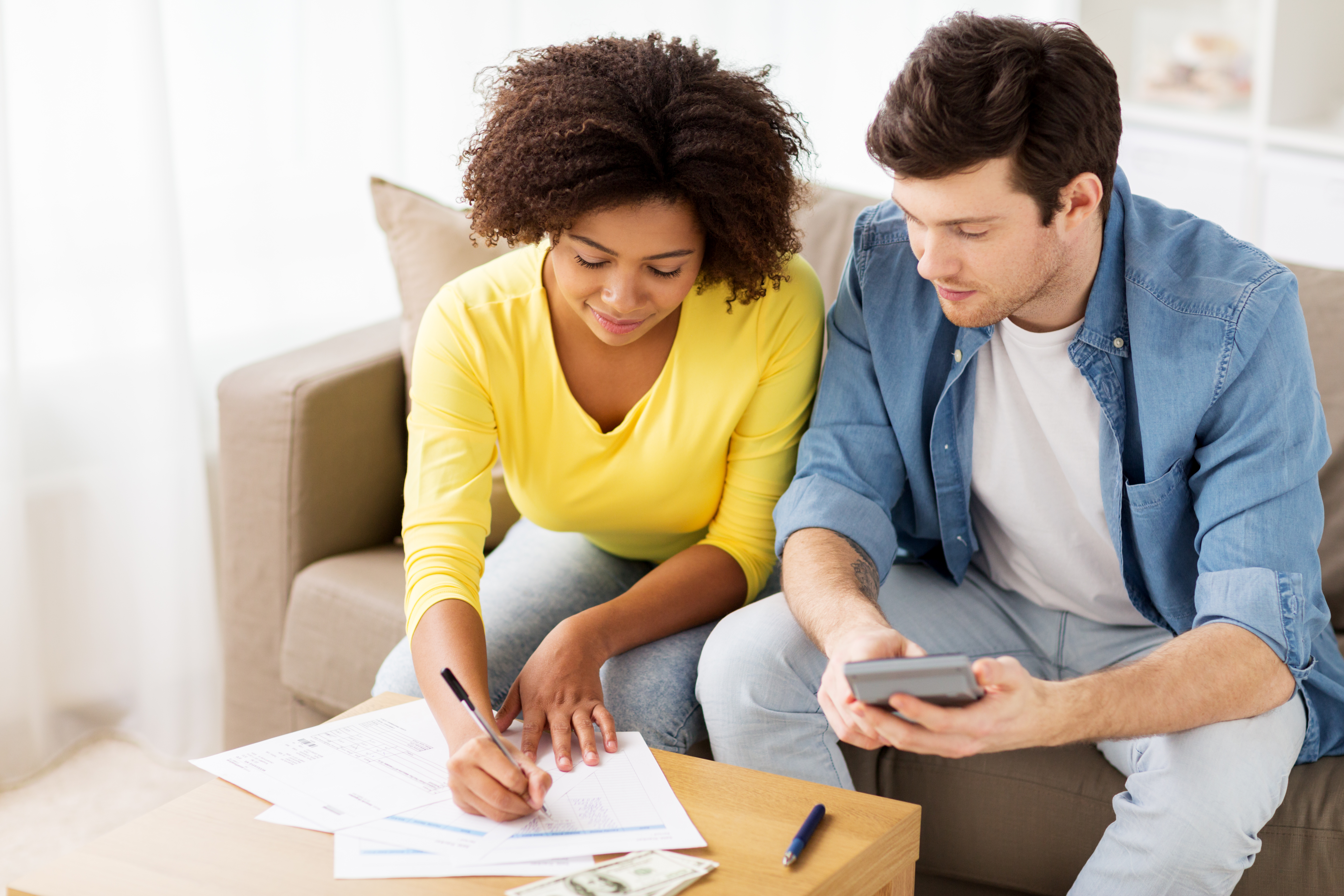 Man and woman looking over paperwork